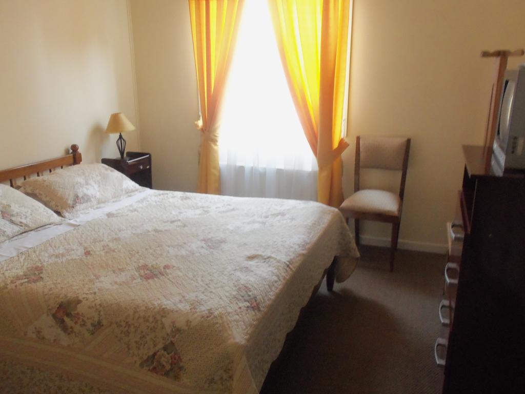 Hostal Joshiken Punta Arenas Szoba fotó