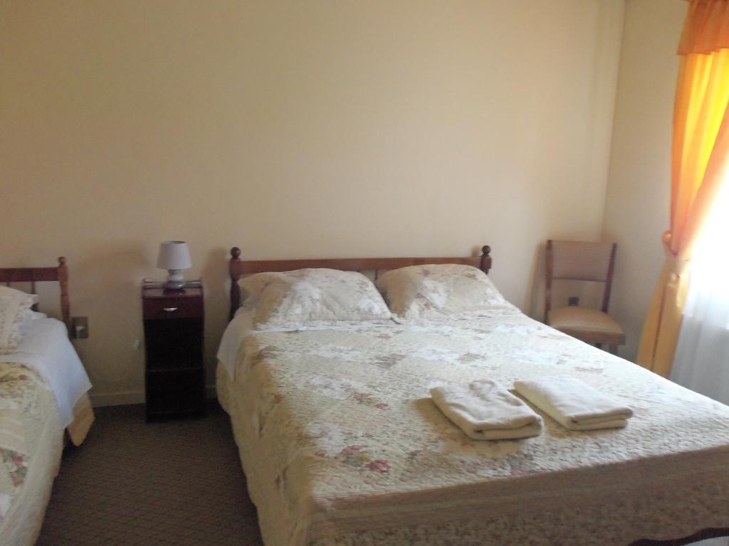 Hostal Joshiken Punta Arenas Szoba fotó
